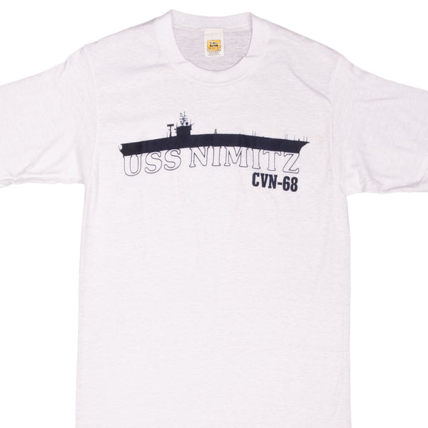 Vintage Usn Navy Uss Nimitz CVN 68 1990S Tee Shirt Size Small Made In Usa With Single Stitch Sleeves  USS Nimitz is an aircraft carrier of the United States Navy, and the lead ship of her class. One of the largest warships in the world, she was laid down, launched, and commissioned as CVAN-68. 