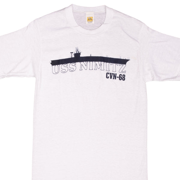 Vintage Usn Navy Uss Nimitz CVN 68 1990S Tee Shirt Size Small Made In Usa With Single Stitch Sleeves  USS Nimitz is an aircraft carrier of the United States Navy, and the lead ship of her class. One of the largest warships in the world, she was laid down, launched, and commissioned as CVAN-68. 