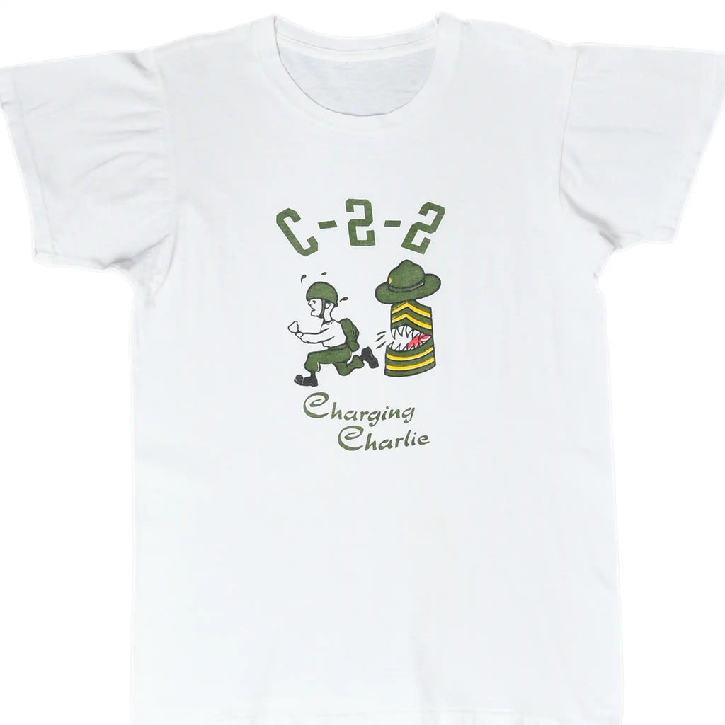 Front of white C-2-2 Charging Charlie T-shirt with green, yellow, black and red graphic.
