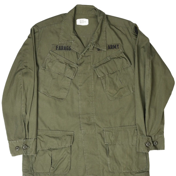 Front of olive US Army 5th pattern tropical combat jacket with Farago and US Army tapes