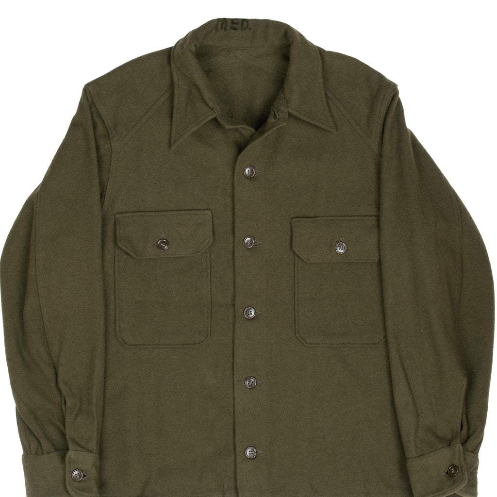 Vintage Us Army Og 108 Wool Shirt 1950S Size Large

Label is missing the Shirt Fits like Large According to the Measurements