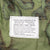 Vintage Us Army Tropical Combat Trousers 6Th Pattern Erdl 1969 Vietnam Size Small Regular Nos Deadstock

DSA 100-69-C-1405

The 6th version of the Tropical Combat Trousers featured a zip rather than the button fly that had been a feature of all prior models. The pocket drain holes, which had been missing from the 4th and 5th patterns, were reintroduced, but the seams above the back pockets were removed. Like the 5th pattern trousers, they were made from rip-stop cotton poplin and were produced in both OG-10