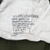 Spec label for olive green 108 wool field trousers, dated 15 Jan. 1952.