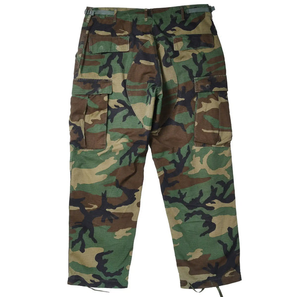 Back view of US Army ripstop woodland camo combat trousers with rear and cargo pockets