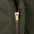 Close-up of the metal zipper fly on US Army M51 wool field trousers