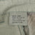 Inside size label for Medium Short US Army woodland camo combat trousers