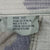 Size label for US Army combat trousers marked Medium-Short with waist and inseam measurements