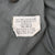 M65 field jacket spec label showing Small Regular and DSA 100-68-C-2018