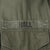 Close-up of Hall name tape above the M65 field jacket chest pocket
