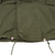 Close-up of M65 field jacket lower front hem with drawcords and worn edge details