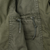 Close-up of the field jacket's interior waist drawcord and stitching
