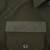 Close-up of rectangular chest patch above the buttoned pocket on the OG 108 field shirt
