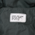 US Army rain coat spec label reading Army Green 274 and DSA 100-67-C-1203