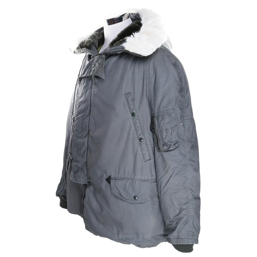 Three-quarter front view of sage green USAF N-3B flight parka with hood trim and sleeve pocket