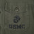 Chest pocket detail with black USMC eagle, globe and anchor stencil