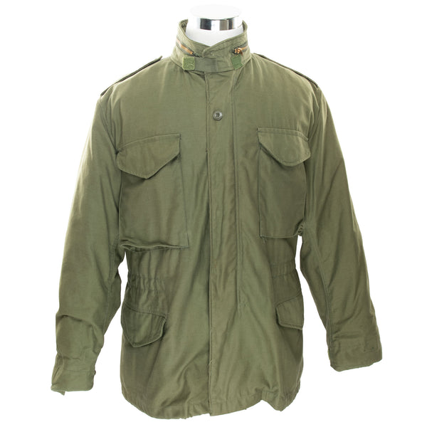 Vintage Us Army M65 Field Jacket 1982 Size Medium Regular

DLA100-82-C-0574

STOCK NO. 8415-00-782-2939

GOLDEN MFG CO