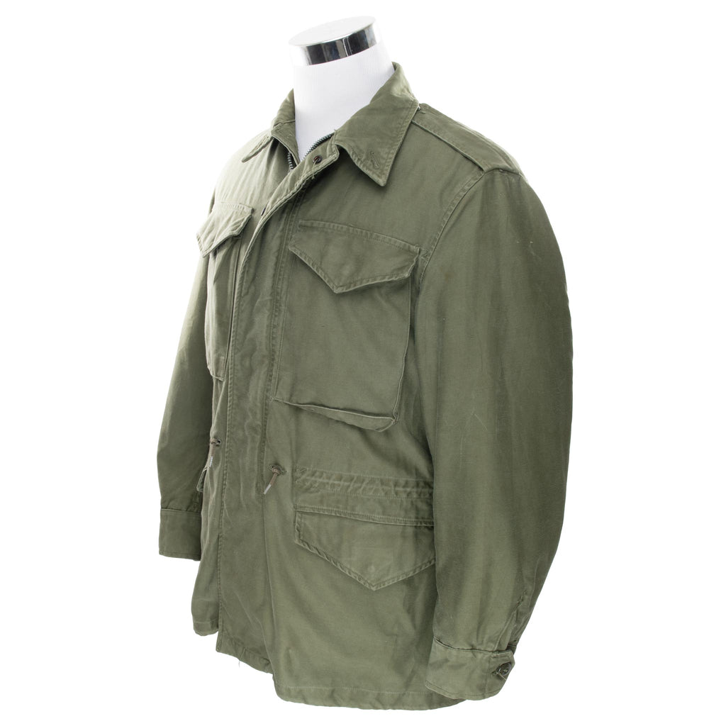 Vintage Us Army M51 Field Jacket 1963 Vietnam War Size Small Regular

DSA- 1-1672-63-C

The M-51 M1951 field jacket was an US Army four pockets jacket made of 9-ounce wind resistant, water repellent treated cotton sateen cloth in Olive Green Shade 107 (OG 107).