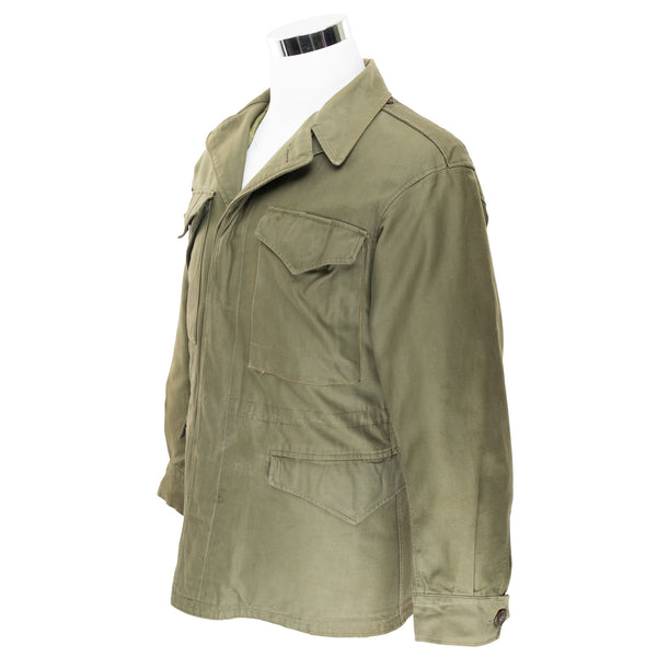 Vintage US Army M-1943 M43 Field Jacket 1940S World War II Size 36R.

With a custom Satin Liner