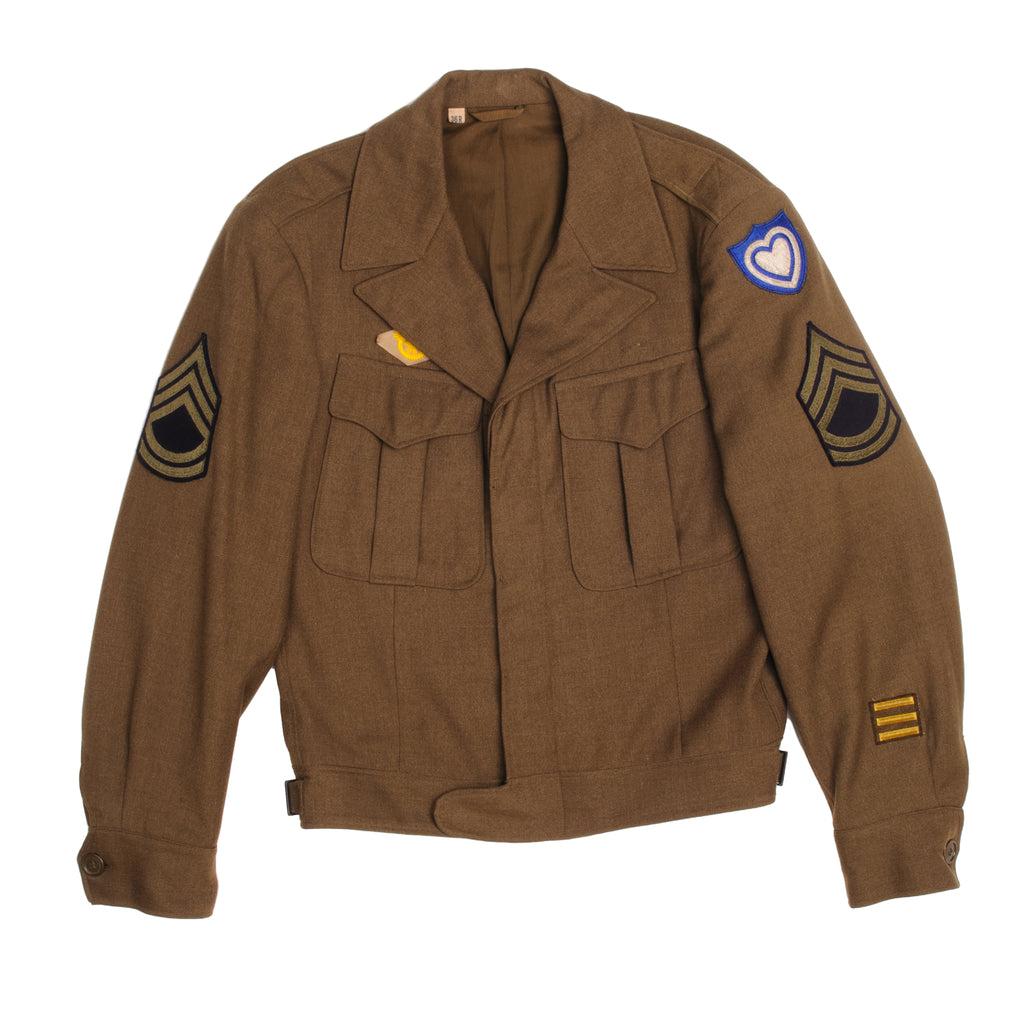 Vintage US Army Field Jacket 1940'S World War 2 With Technical Sergeant Second Grade, WW2 Honorable discharge "Rupture Duck", 1 year and half overseas bar, US Army 24th Corps patch. 