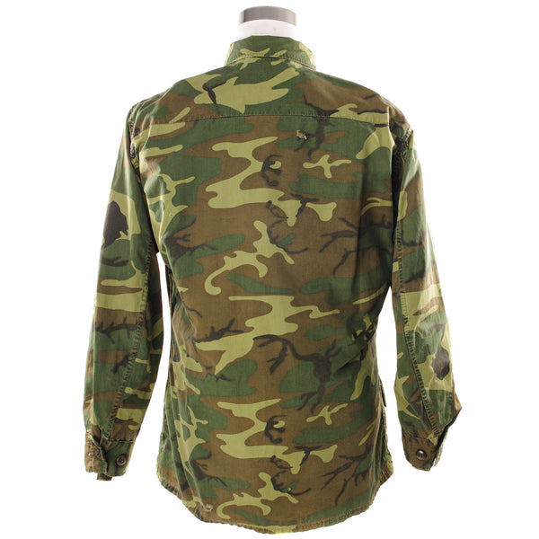 The Tropical Combat Jacket was designed in 1962 by Natick Labs for the Special Forces in Vietnam.  There is a total of 5 different Patterns produced in OG-107 and 3 of them produced in ERDL camouflage.  The 3rd Pattern is made with Cotton Poplin.